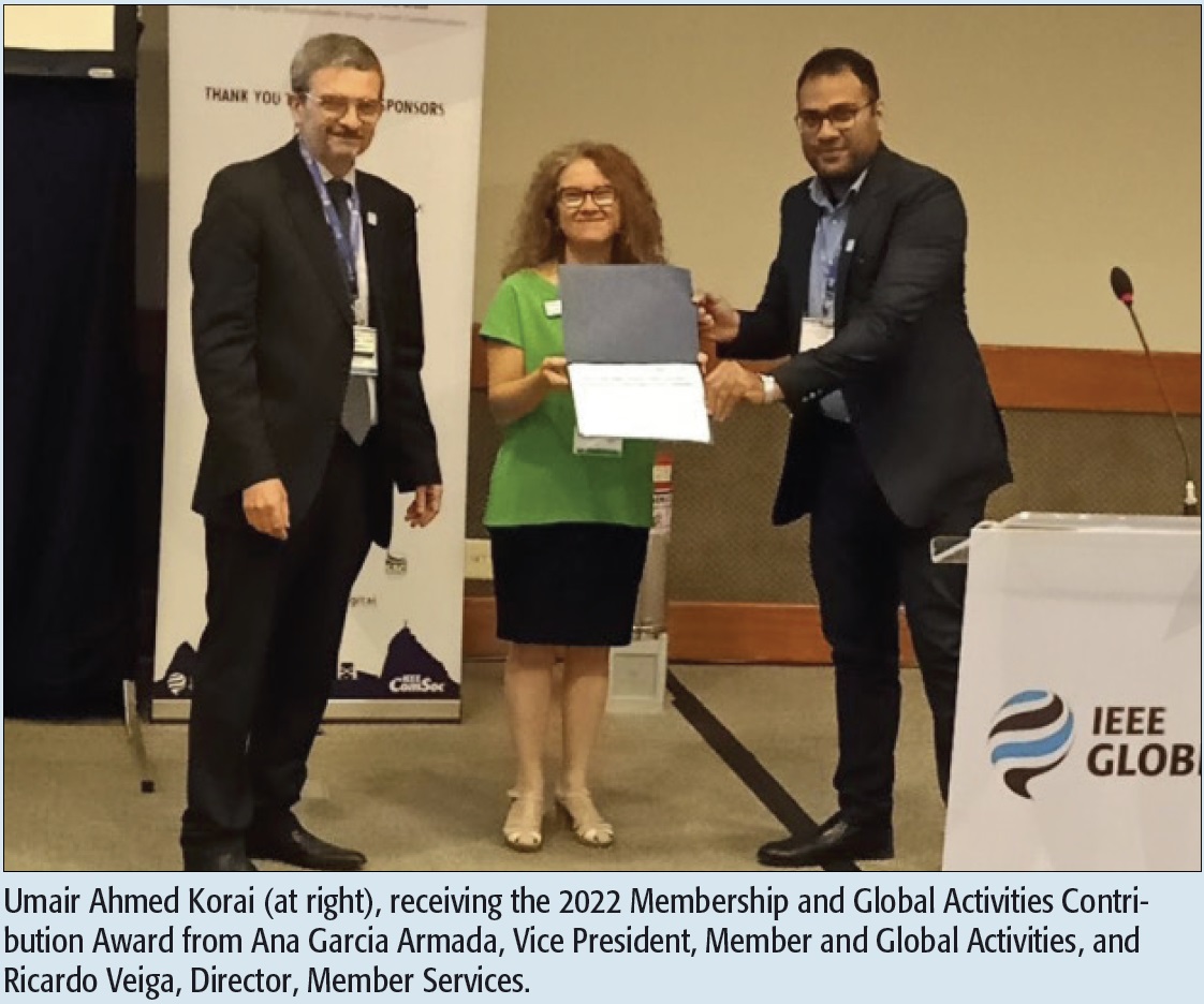 Umair Ahmed Korai (at right), receiving the 2022 Membership and Global Activities Contribution Award from Ana Garcia Armada, Vice President, Member and Global Activities, and Ricardo Veiga, Director, Member Services.