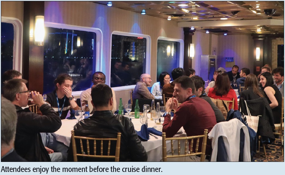 Attendees enjoy the moment before the cruise dinner