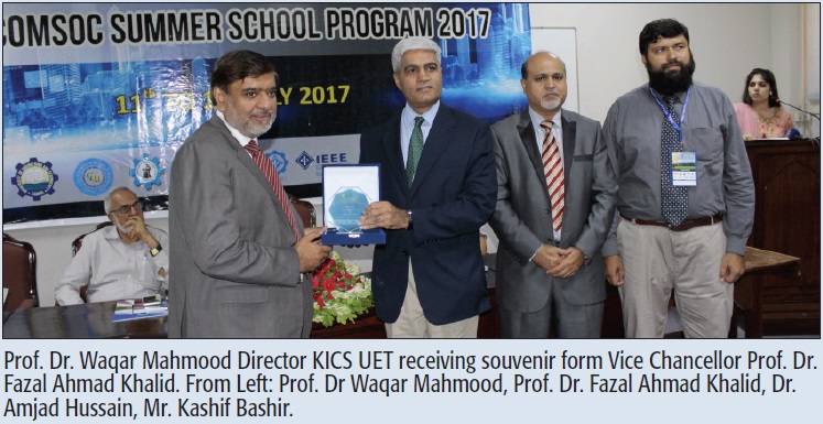 Prof. Dr. Waqar Mahmood Director KICS UET receiving souvenir form Vice Chancellor Prof. Dr. Fazal Ahmad Khalid. From Left: Prof. Dr Waqar Mahmood, Prof. Dr. Fazal Ahmad Khalid, Dr. Amjad Hussain, Mr. Kashif Bashir.