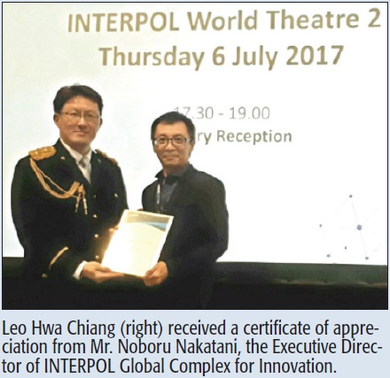 Leo Hwa Chiang (right) received a certificate of appreciation from Mr. Noboru Nakatani, the Executive Director of INTERPOL Global Complex for Innovation.