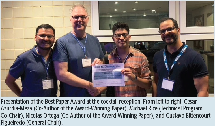 Presentation of the Best Paper Award at the cocktail reception. From left to right: Cesar Azurdia-Meza (Co-Author of the Award-Winning Paper), Michael Rice (Technical Program Co-Chair), Nicolas Ortega (Co-Author of the Award-Winning Paper), and Gustavo Bittencourt Figueiredo (General Chair).
