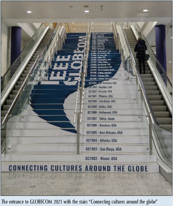 The entrance to GLOBECOM 2021 with the stairs “Connecting cultures around the globe”