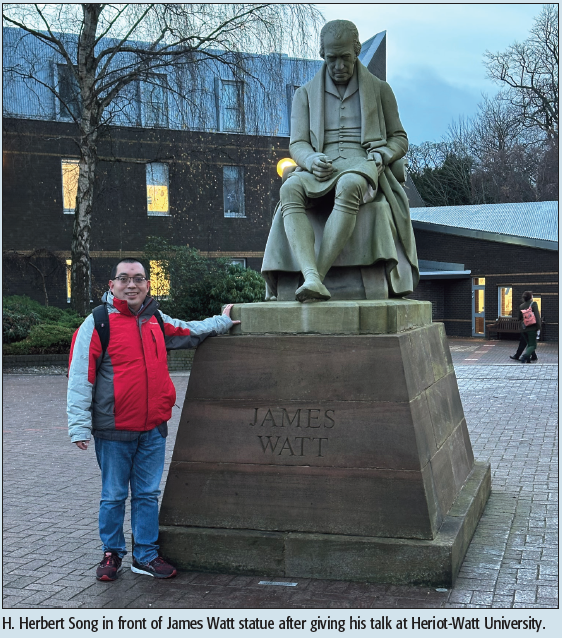 H. Herbert Song in front of James Watt statue after giving his talk at Heriot-Watt University.