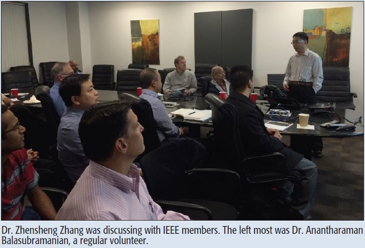 Dr. Zhensheng Zhang was discussing with IEEE members. The left most was Dr. Anantharaman Balasubramanian, a regular volunteer.