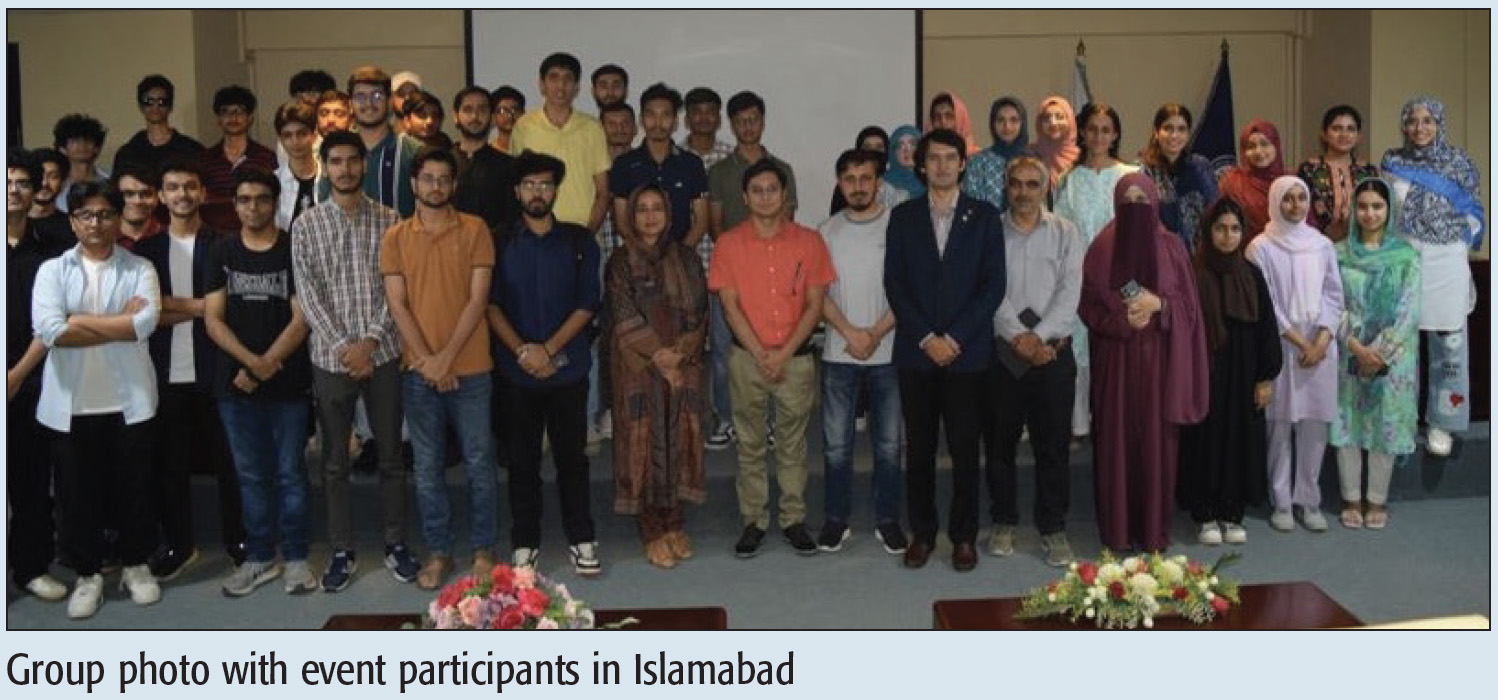 Group photo with event participants in Islamabad